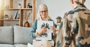 How a Memory Care Facility Honors Veterans Through Sensory Storytelling 2 senior woman in memory care facility